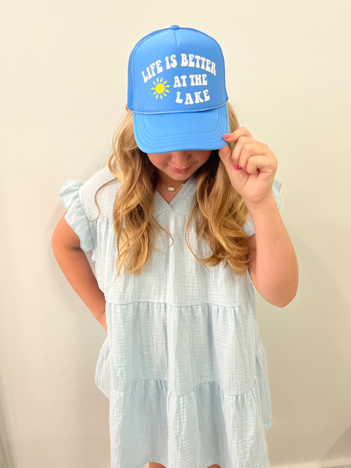 Life is better at the lake trucker hat