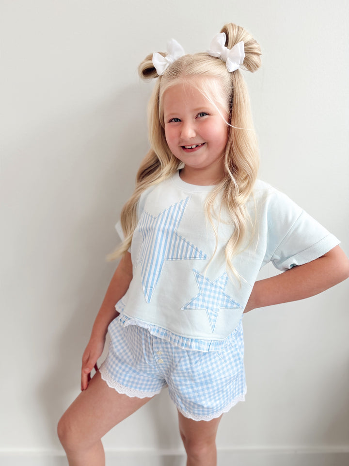 Star Applique Ruffle Hem Top